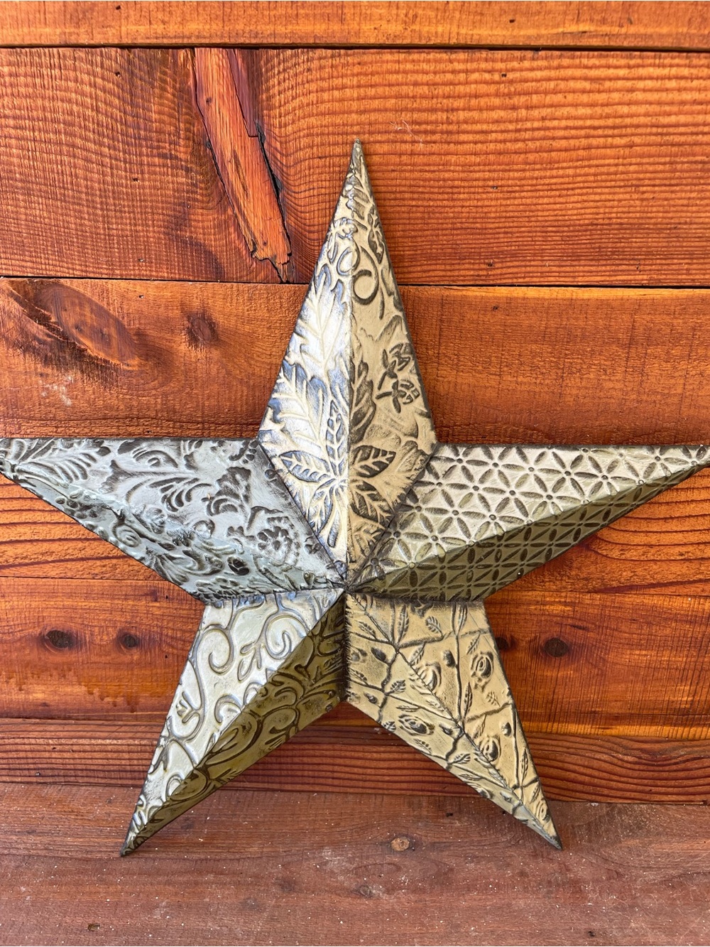Decorative Metal Star Wall Accent in Antique Gold